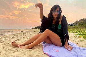 Beautiful Girl Enjoys Sunset Beach Vibes