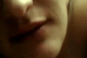 Hot brunette cam girl masturbates with a dildo and interacts with the viewers.