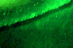 Cute girl paces through the store while spied on hidden cam outdoors.