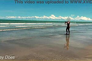 Wife strips for nude football on public clothed beach