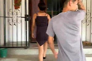 Emily, a Latina amateur, enjoys outdoor parking lot sex with an interracial partner.