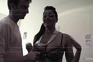 Three men have sex with two women with brown hair on the couch.