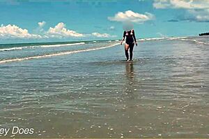 Wife strips for nude football on public clothed beach