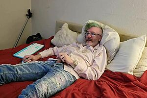 Clothed amateur masturbates and achieves orgasm.