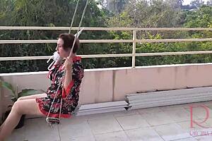Depraved Housewife Swings Naked Under Umbrella in Rain Full Video