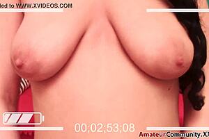 Watch this horny brunette babe undressing slowly on her webcam for you