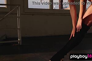 Flexible naked redhead dancer practices ballet seductively
