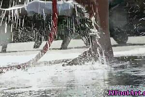 petite babe strokes feet on hard cock