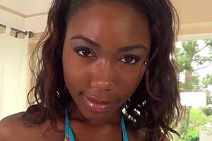 Thick ebony babe gives blowjob in interracial sex.