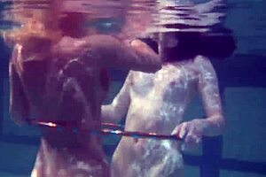 Underwater acrobatics lesbians irina barna and anna feher in pool with tight pussies