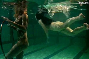 Underwater acrobatics lesbians irina barna and anna feher in pool with tight pussies