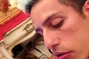 A masked older gay man