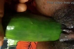 Cyndy Blackslave undergoes cucumber fucking with squirting in close-up homemade BDSM scene