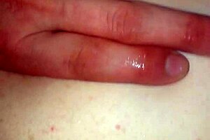 Real homemade video of a couple having sex while they are in the middle of a slippery and wet scene