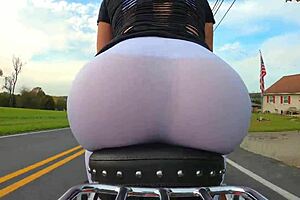 Amateur bodybuilder shows off his motorcycle skills with a curvy housewife