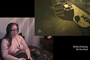 Naked brunette plays Outlast, big tits exposed