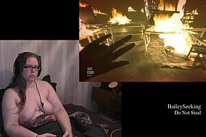 Naked brunette plays Outlast, big tits exposed