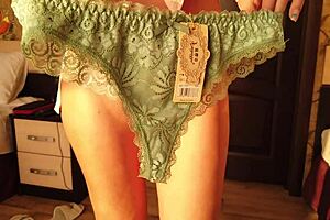 Redhead Foxy Tries On Panties In Holiday POV