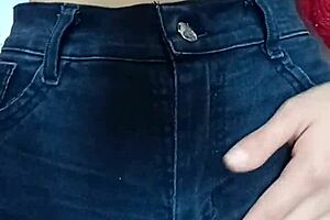 i'm playin with a belt spankin her pussy hard.