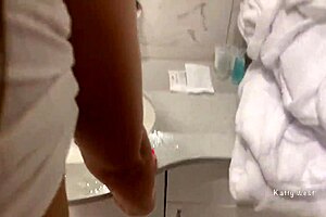 Young babe sucks and fucks! Bathroom action!