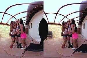 Three redhead Europeans in table tennis threesome on desk.