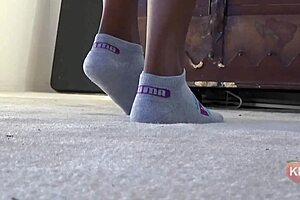 exploring puma socks in fetish style with ebony cougar