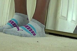 exploring puma socks in fetish style with ebony cougar