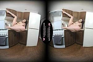 Sara Bork fingers her shaved pussy in the kitchen while caressing big tits