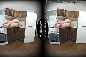 Sara Bork fingers her shaved pussy in the kitchen while caressing big tits