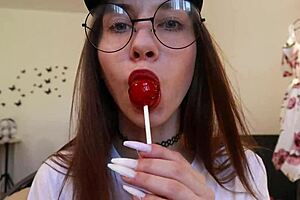 Nothing unusual, just sucking chupa chups in clothes!