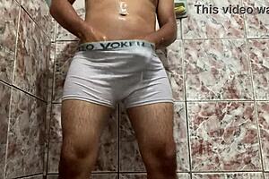 First time bisexual gay porn star's solo scene in the bathroom