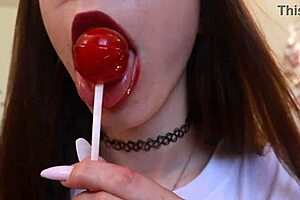 Nothing unusual, just sucking chupa chups in clothes!