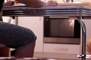 Couple enjoys quick homemade dinner preparation without explicit acts