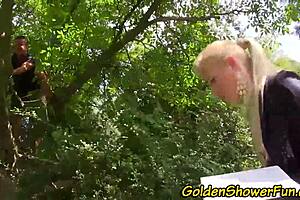 Glam babe in fetish scene