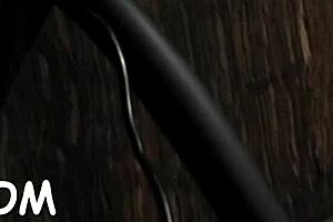 Brunette slave rides huge fake penis in BDSM