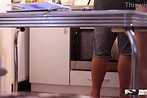 Couple enjoys quick homemade dinner preparation without explicit acts