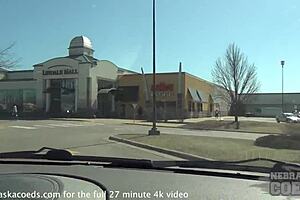 Skinny blonde masturbates while driving