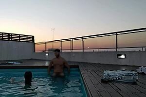 Beautiful big tits and big black cock in hot anal scene at sunset next to the pool