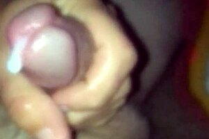 Intensely playing with the camera.