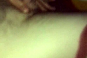 Intensely playing with the camera.