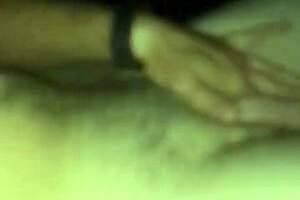 Intensely playing with the camera.