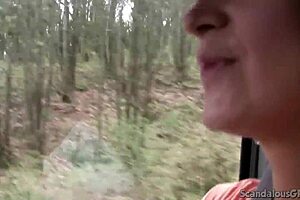 Brunette babe handjobs cock while driving caught on tape