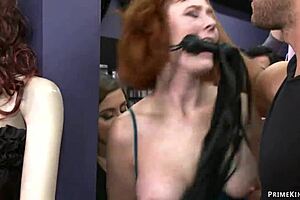 Submissive women with big bosoms engage in anal sex in a sex shop in public