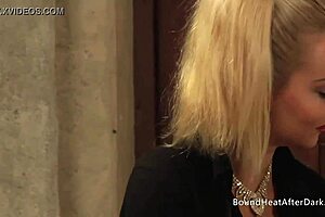 sexy maid bound in afterdark bondage gets an orgasm from her mistress's golden strap-on