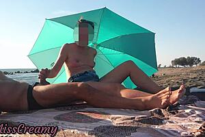 Public beach masturbation with hidden cam leads to trouble