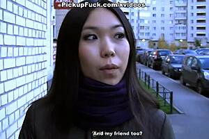 Young asian gives blowjob then takes it in the ass outdoors