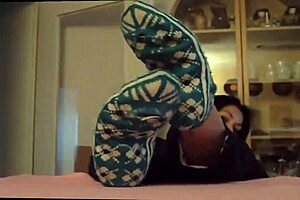 Mature wife enjoys her sexy feet being licked in intense feet fetish play.