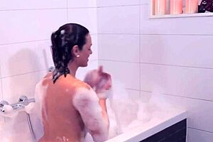 hey, wanna see a solo shemale tug in the bath?