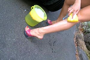 In The German Carwash, Alisha Sweet Gives An Erotic Handjob To The Customer