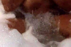 Enjoying a steamy solo session in the jacuzzi